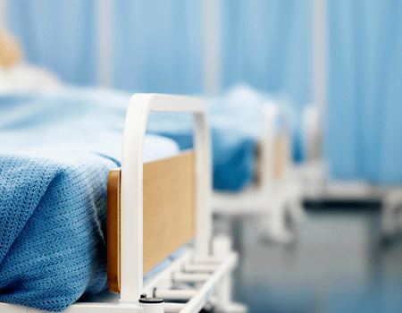 A photo of hospital or treatment facility beds