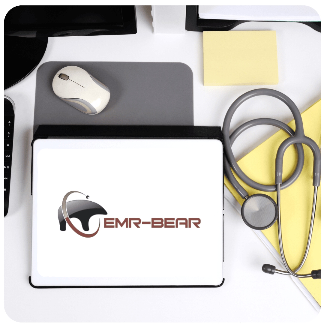 EHR & PM Technology on a practitioners desk