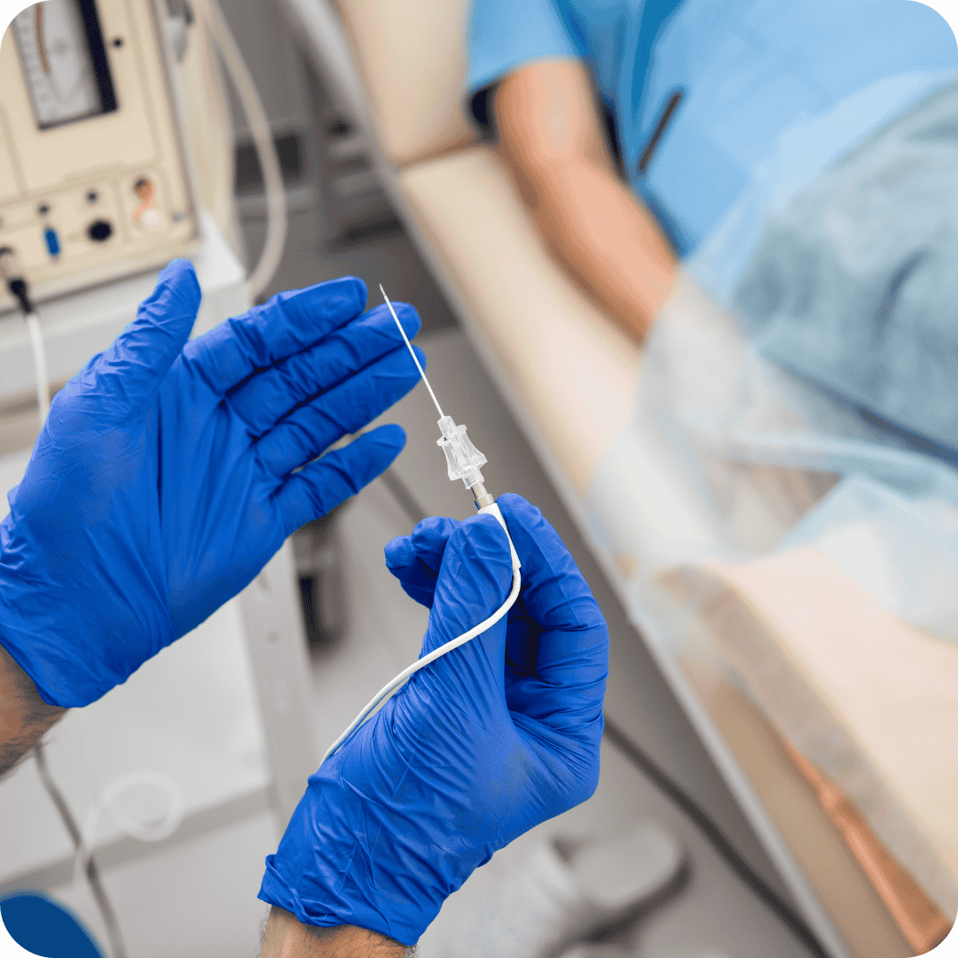 Photo of a medical professional dispensing medication to a patient via an iv