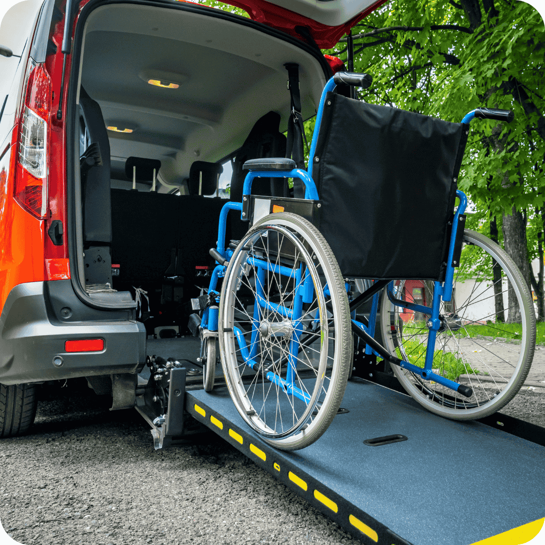 Non Emergency Medical Transport showing a wheelchair being loaded into a van