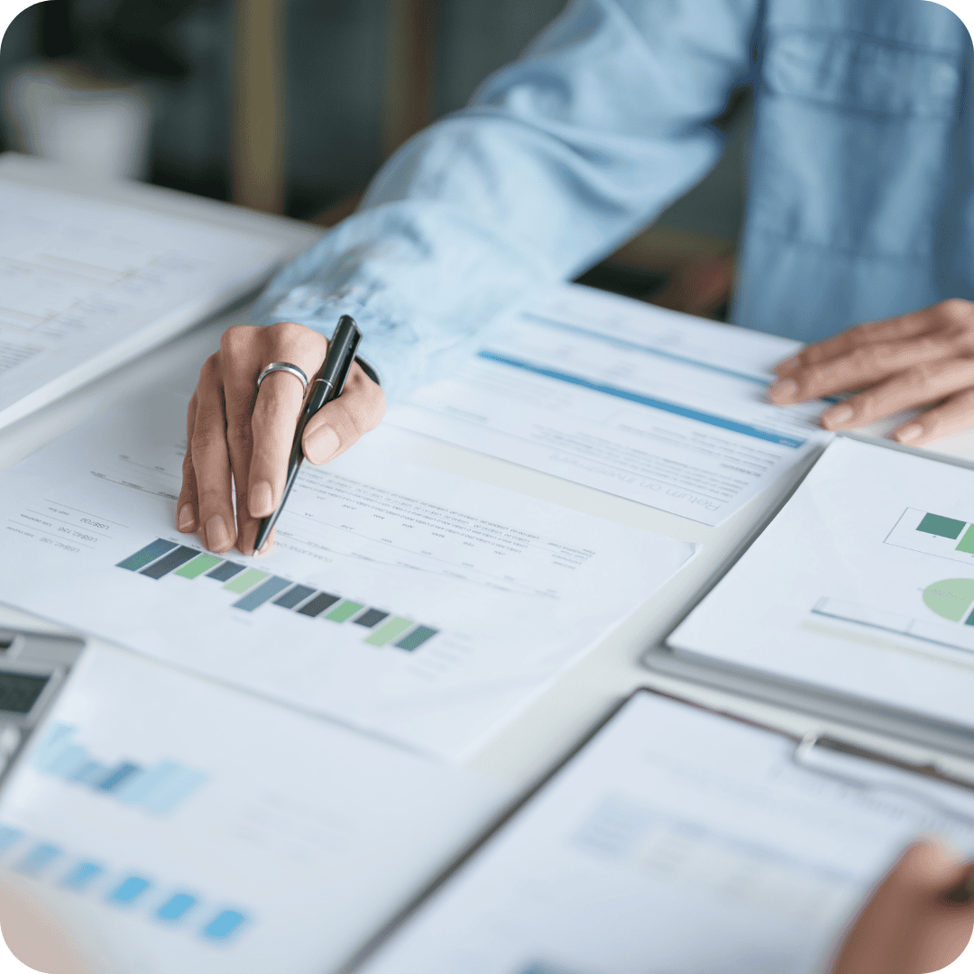 An image of a business person reviewing revenue cycle management reports for their medical office
